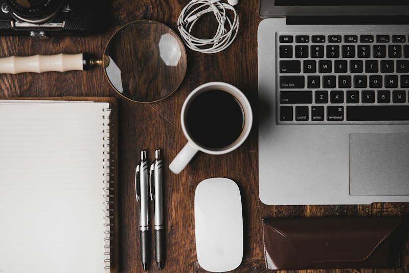 A tidy home-office desk with a laptop