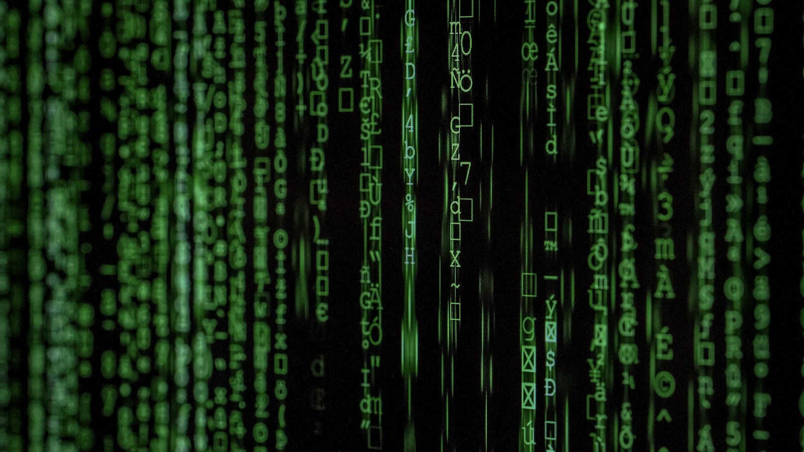Lines of green code on a dark computer screen